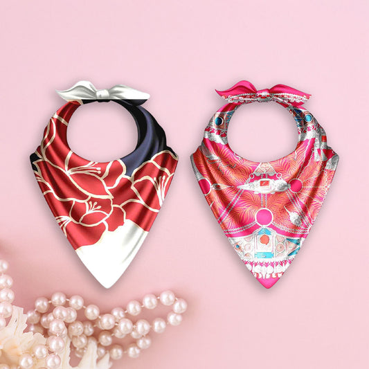 Two patterned bandanas with decorative bows on a pink background with pearls.