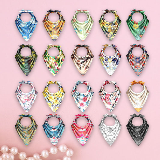 Collection of colorful bandanas on a pink background