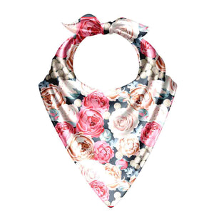 Floral patterned bib on a white background