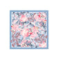 Floral patterned fabric square with pink and blue flowers on a light blue background