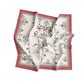 Decorative scarf with intricate patterns on a white background