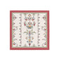Decorative tablecloth with intricate floral and paisley patterns on a white background