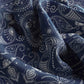 Navy blue fabric with white paisley pattern