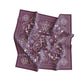 Purple paisley patterned bandana on a white background