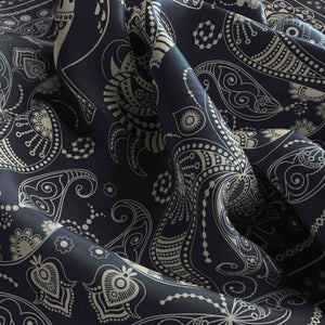 Navy blue fabric with white paisley pattern