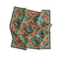 Decorative scarf with intricate paisley pattern on a white background