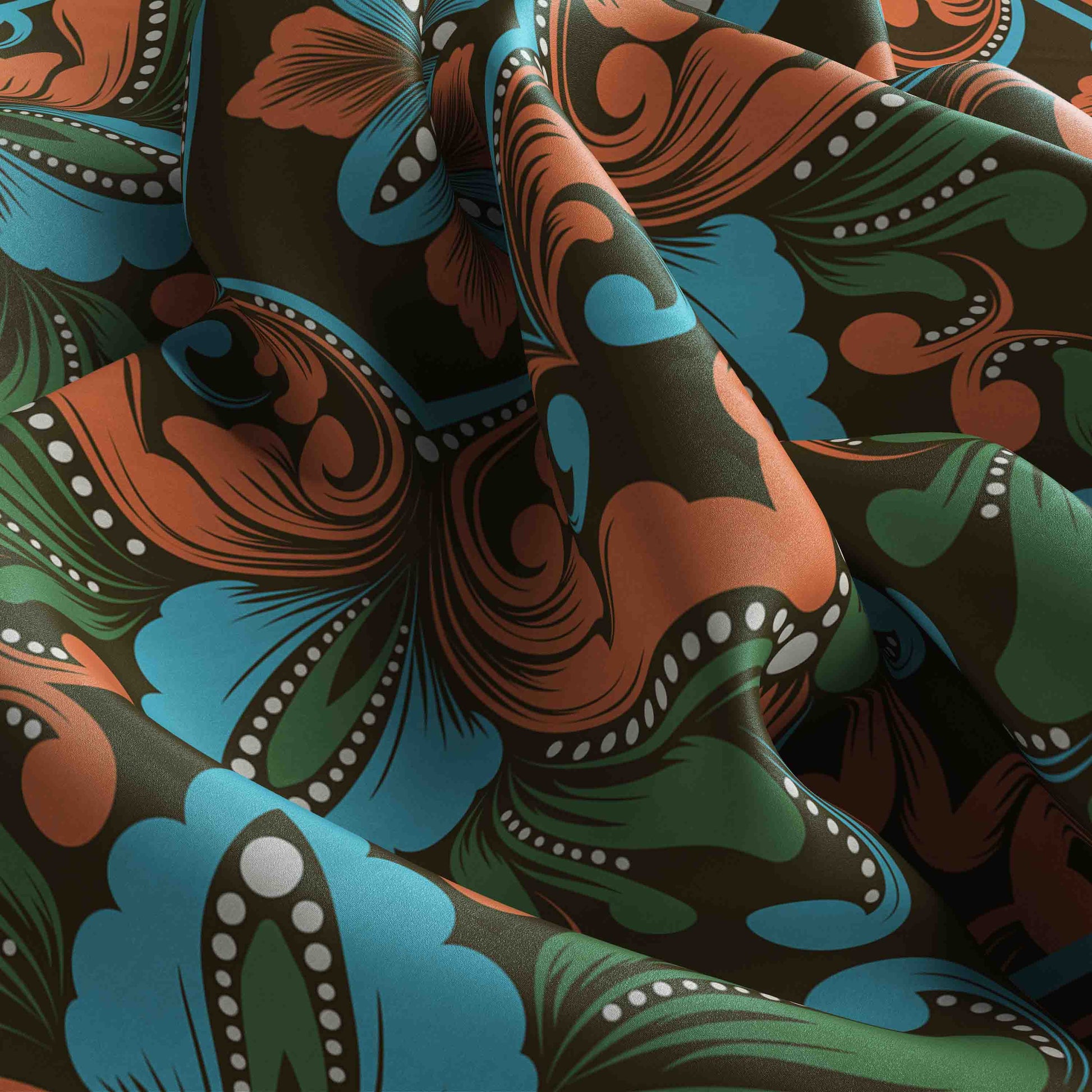 Close-up of fabric with a colorful abstract pattern in brown, blue, and green.