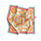 Colorful floral patterned scarf on a white background