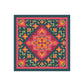Colorful patterned fabric square with geometric design on a white background
