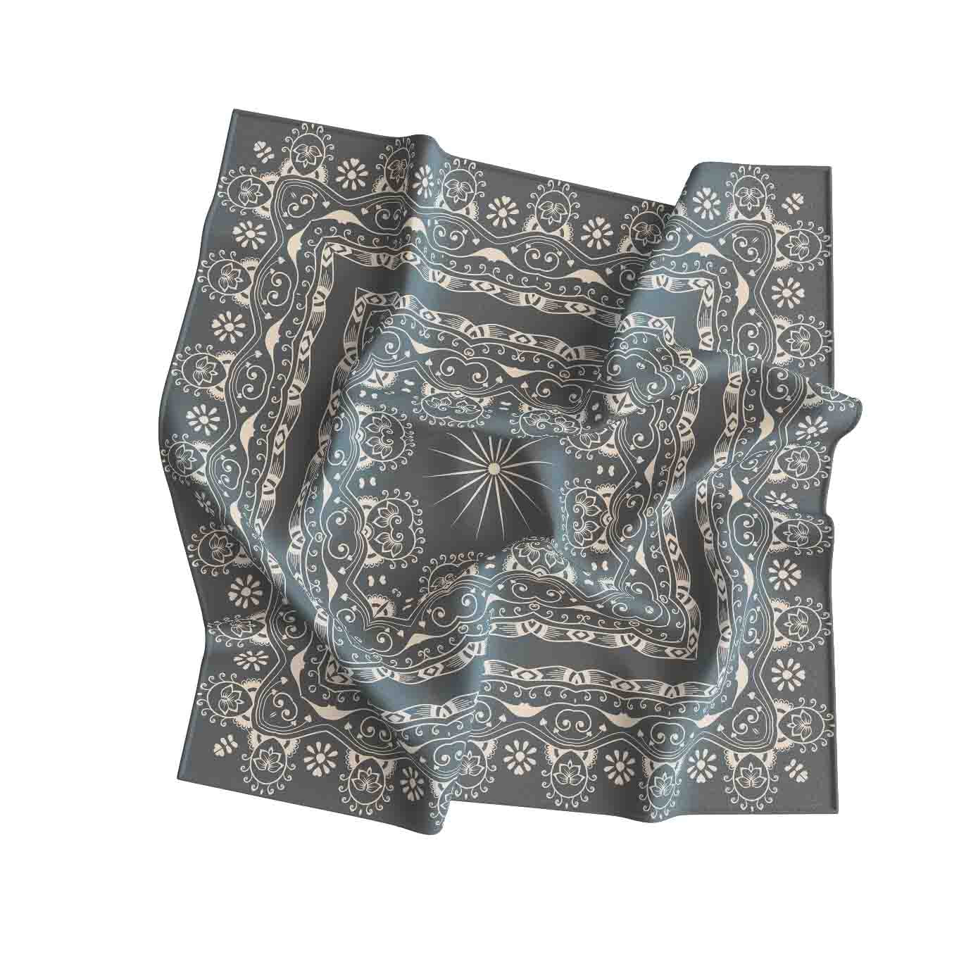 Folded bandana with intricate pattern on a white background