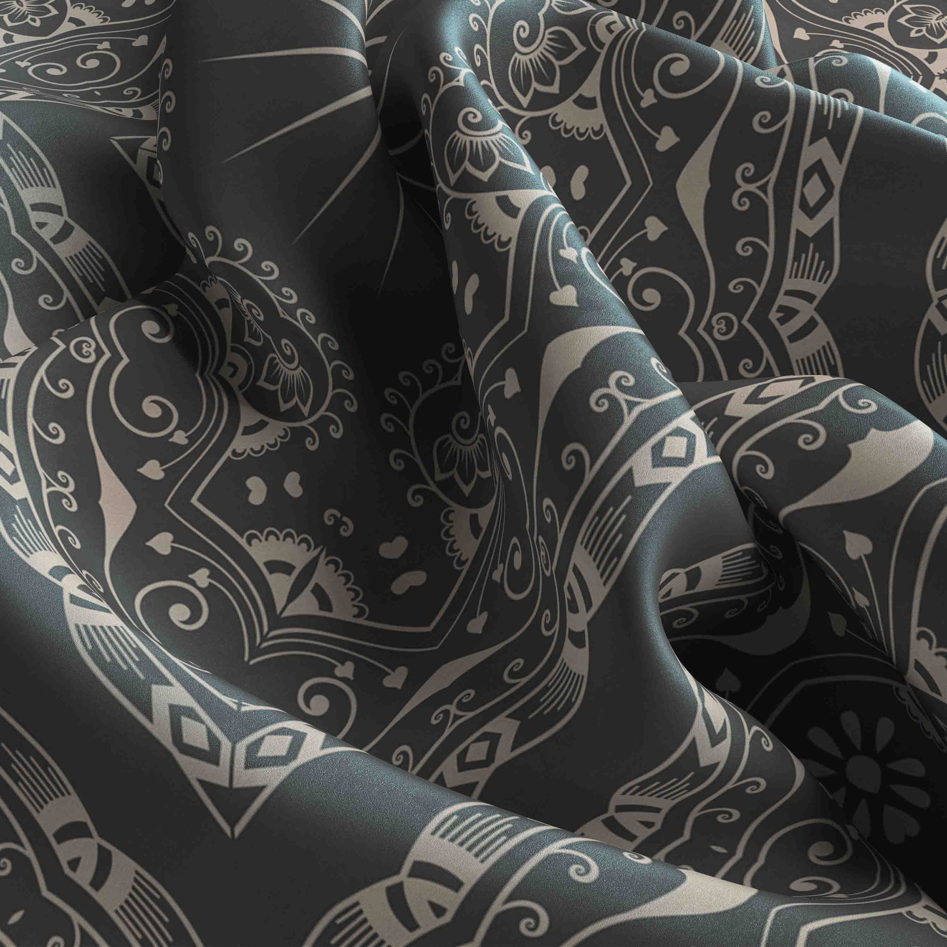Close-up of dark fabric with intricate white patterns
