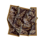 Folded scarf with leaf pattern on a white background