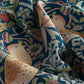 Close-up of colorful fabric with floral and bird pattern