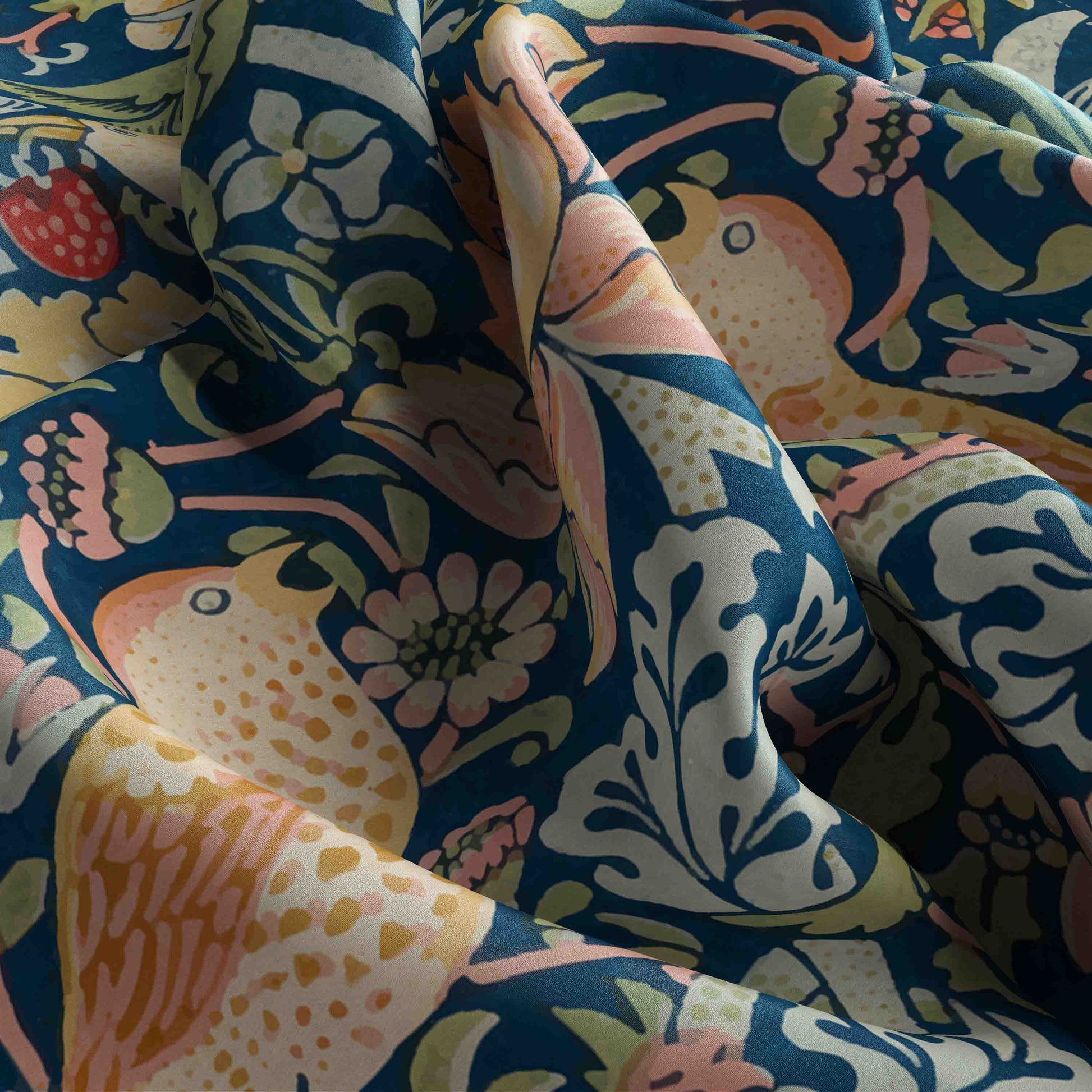 Close-up of colorful fabric with floral and bird pattern