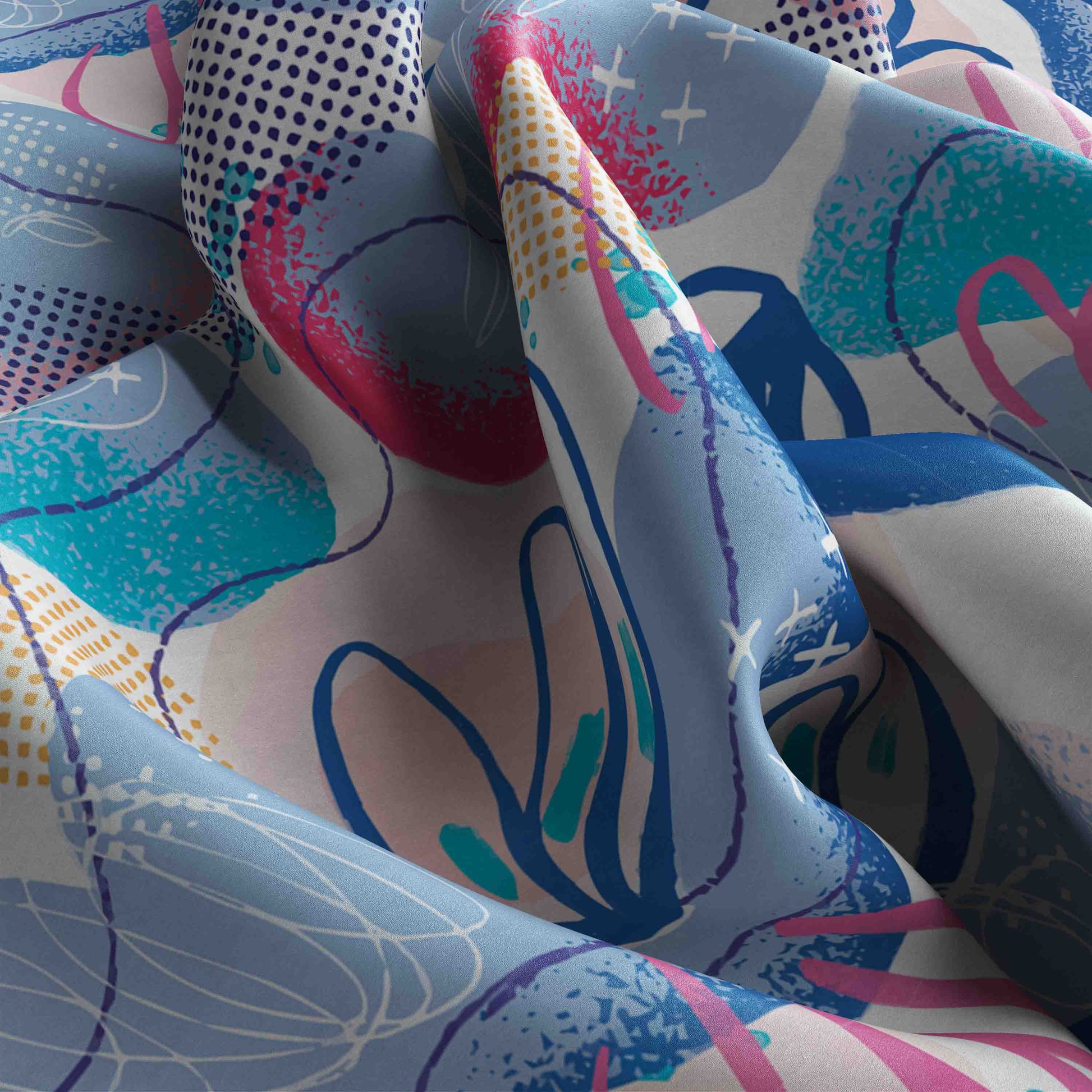Colorful fabric swatches with abstract patterns in various colors.