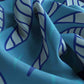 Blue fabric with white leaf patterns