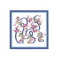 Decorative monogram with floral elements and birds on a white background