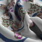 Floral patterned fabric with colorful flowers on a white background