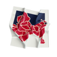 Floral patterned fabric with red and white flowers on a blue and white background
