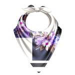Floral patterned bandana with a white bow on a white background