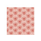 Patterned paper with red floral design on a pink background