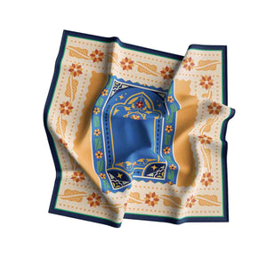 Decorative scarf with floral and geometric patterns on a white background