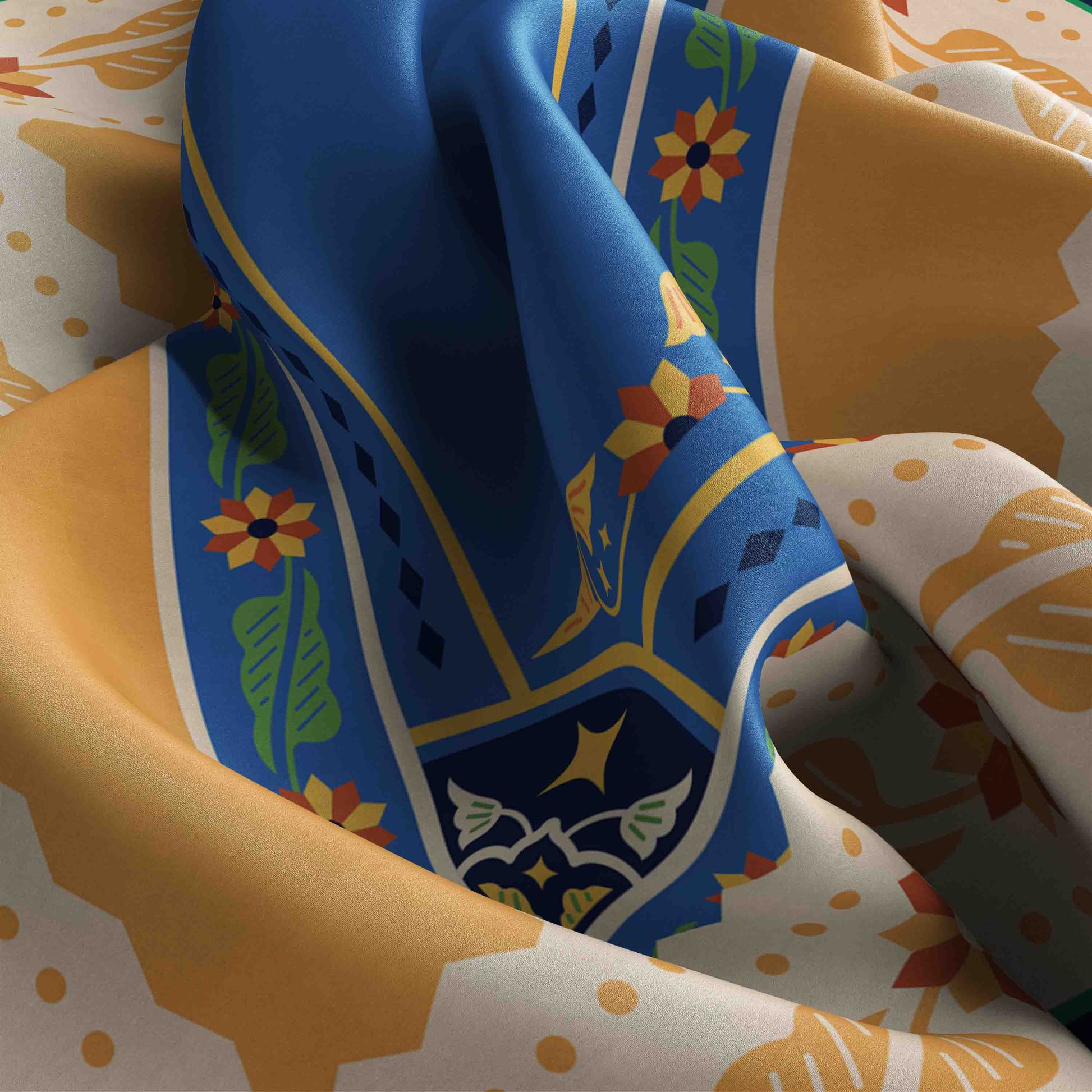 Colorful fabric with a blue pattern featuring flowers and geometric shapes on a multicolored background.