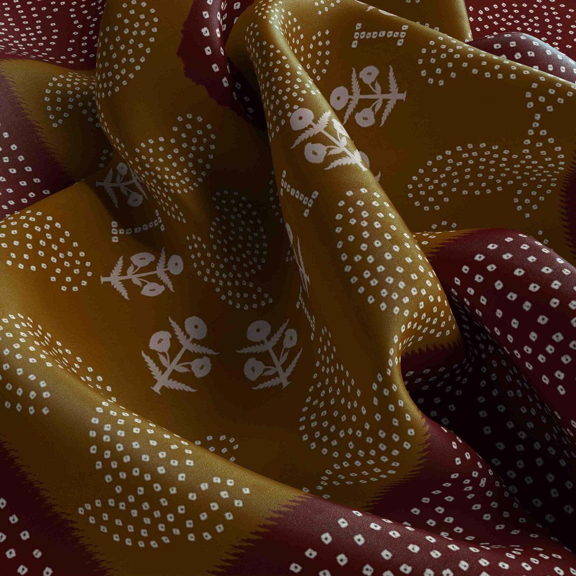 Close-up of patterned fabric with white floral designs on a dark background