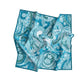 Teal and white paisley patterned fabric on a white background