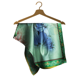 Floral scarf on a wooden hanger against a white background
