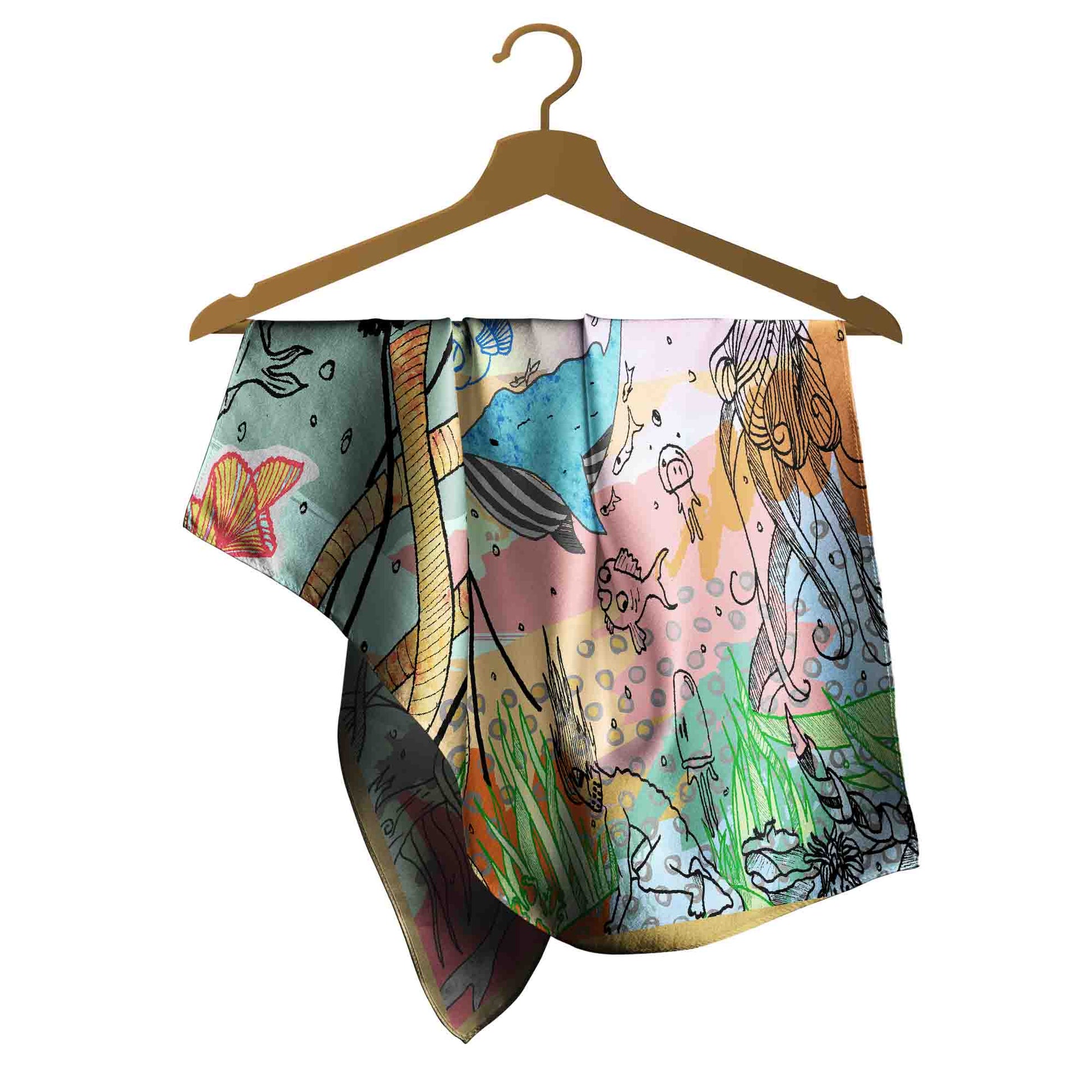 Colorful patterned fabric on a wooden hanger against a white background