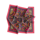 Colorful patterned scarf with a vibrant design on a white background