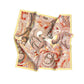 Paisley patterned fabric on a white background